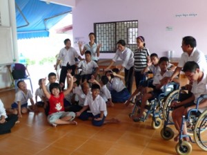 Disabled children gathered in a classroom