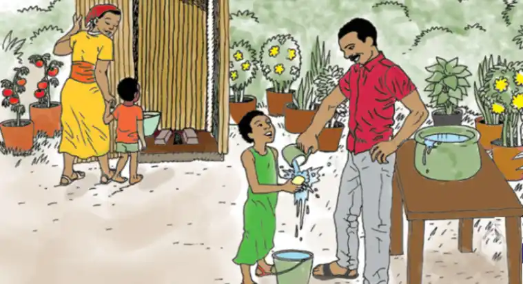 Man helps a child wash hands using a cup, bucket and soap while a woman walks other child to an outdoor bathroom.