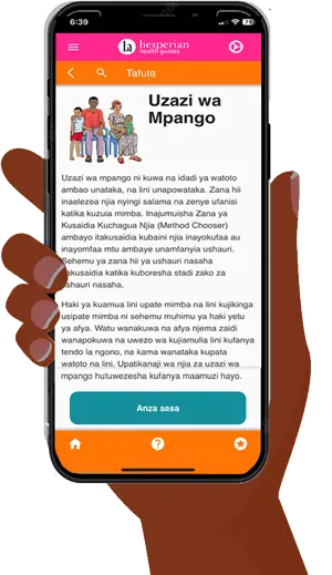 A hand dolding a mobile phone with the home screen of the Family planning app displayed.
