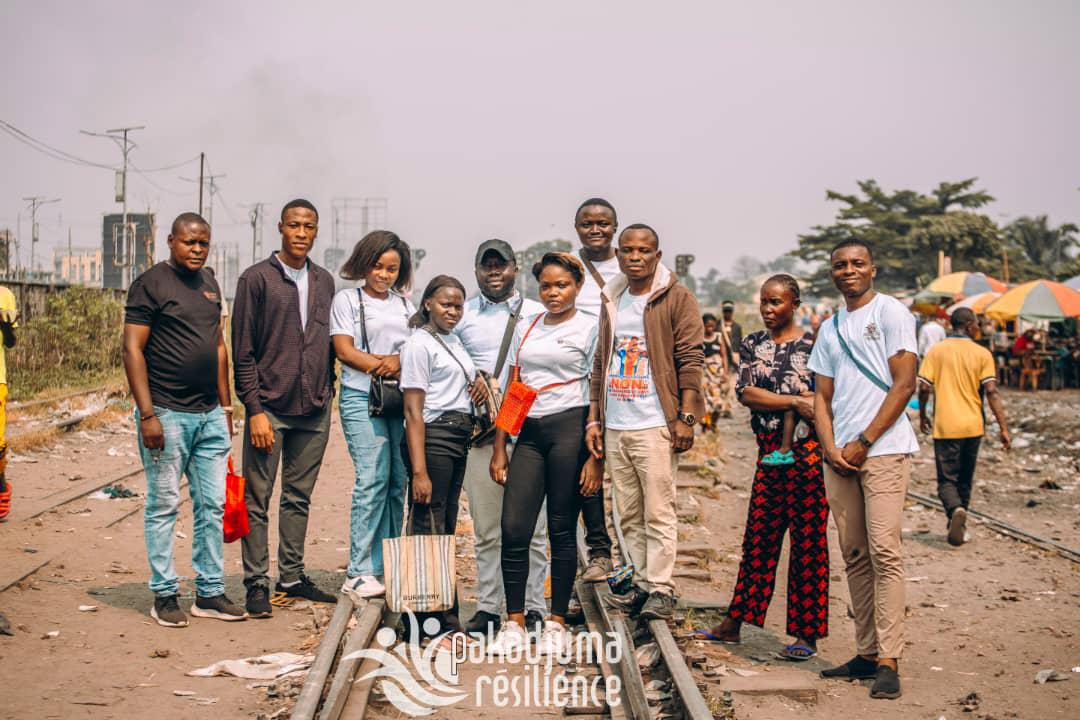 Members of the Pakadjuma team pose during an outreach event